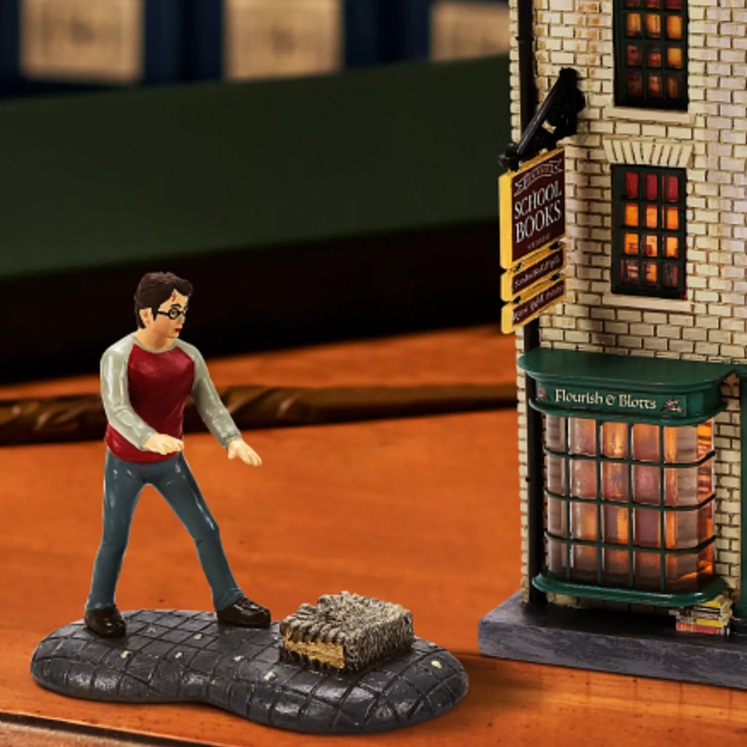 The Jolly Christmas Shop Harry Potter | Department 56 Harry Potter Village Harry & His Monster Book Figure 6010456