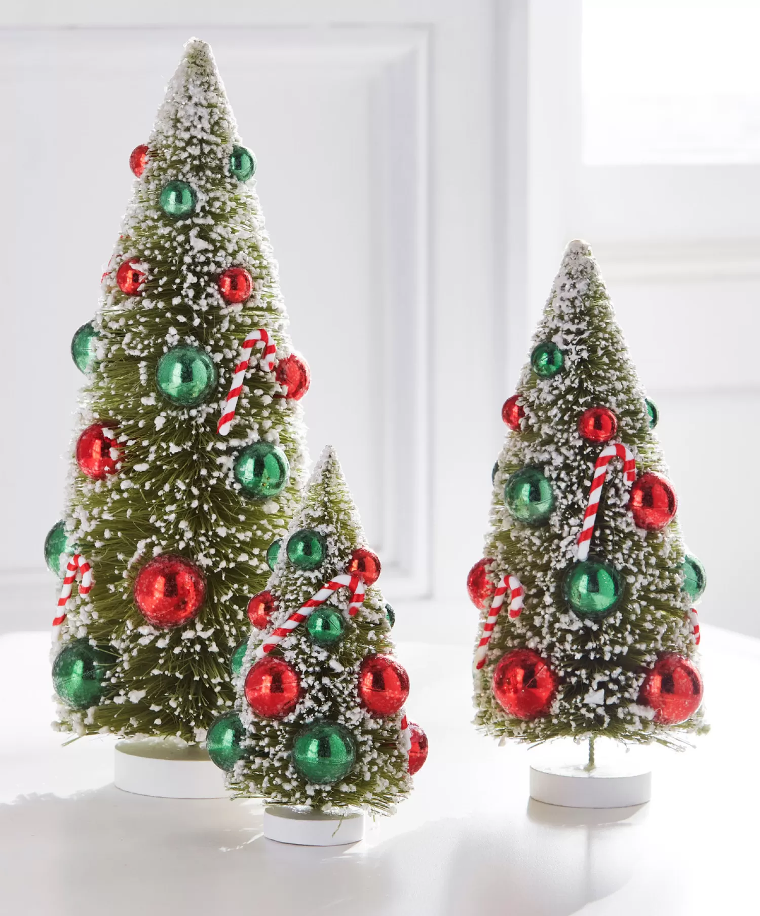 The Jolly Christmas Shop Candy Land | Tinsel Town | Raz 12" Set Of 3 Snowy Christmas Bottle Brush Trees With Candy Cane Ornaments 4416110