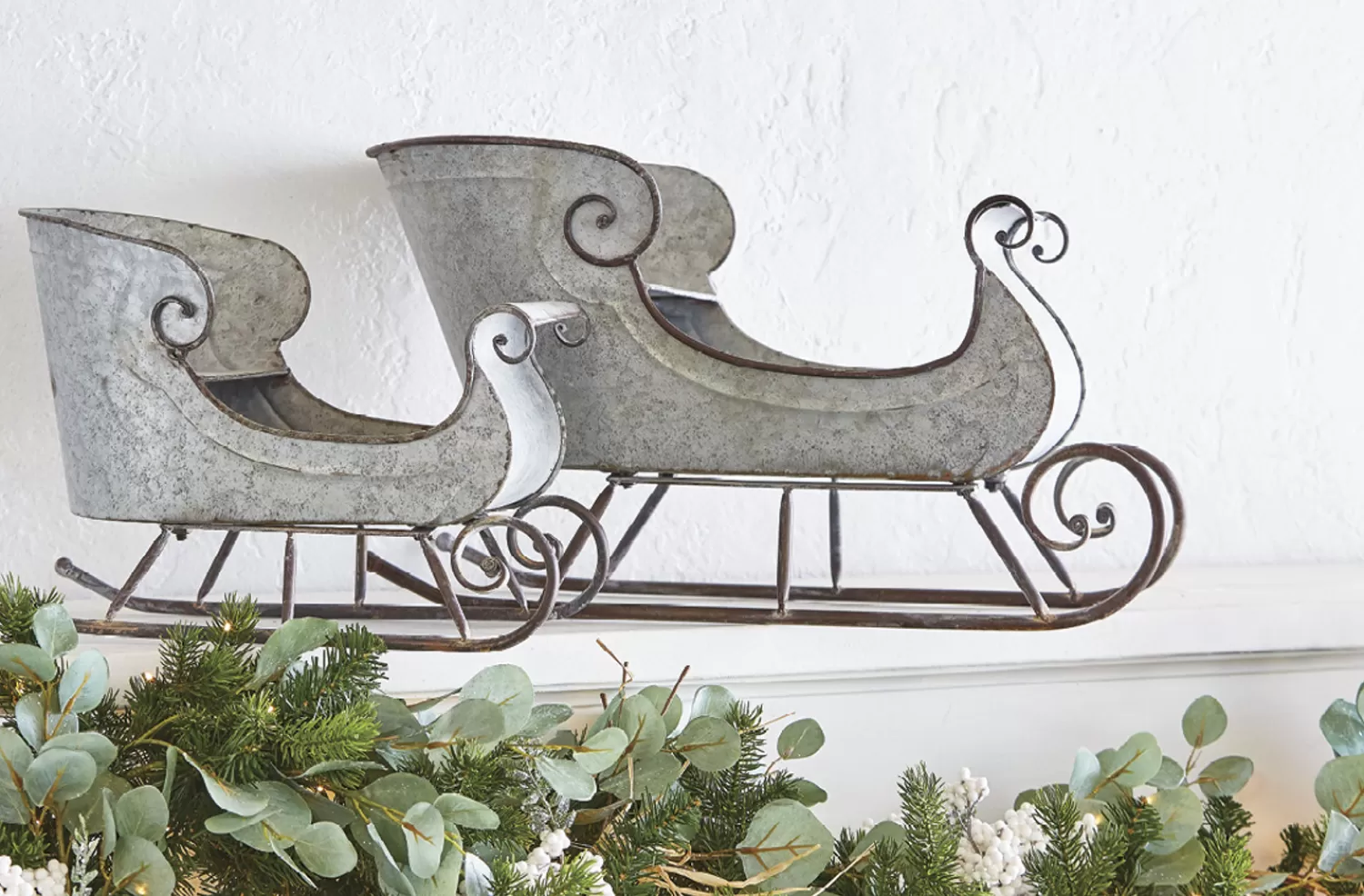 The Jolly Christmas Shop All Is Calm | Gingerbread Lane | Raz 16.5" & 24.5" Galvanized Distressed Metal Sleighs Set Of 2 Christmas Decoration 4128884