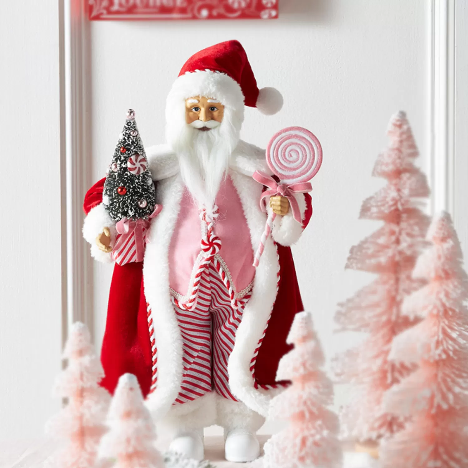 The Jolly Christmas Shop Jingle And Cocoa | Santa Christmas Decorations | Raz 18" Peppermint Swirl Santa Christmas Figure With Pink Vest 4315531