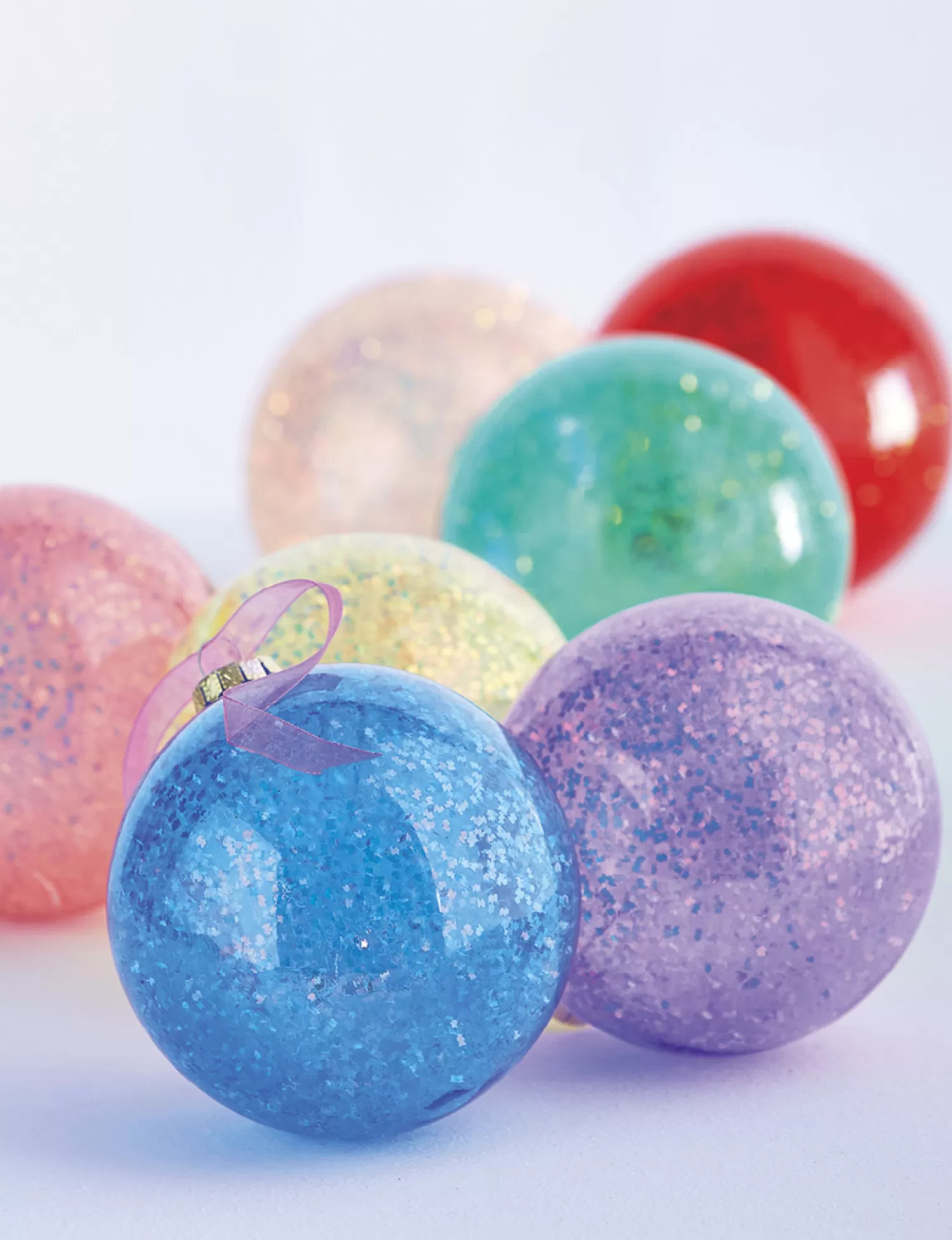 The Jolly Christmas Shop Easter Ornaments | Charming Holiday | Raz 4.5" Set Of 7 Rainbow Glittered Glass Ball Christmas Ornaments 4224623