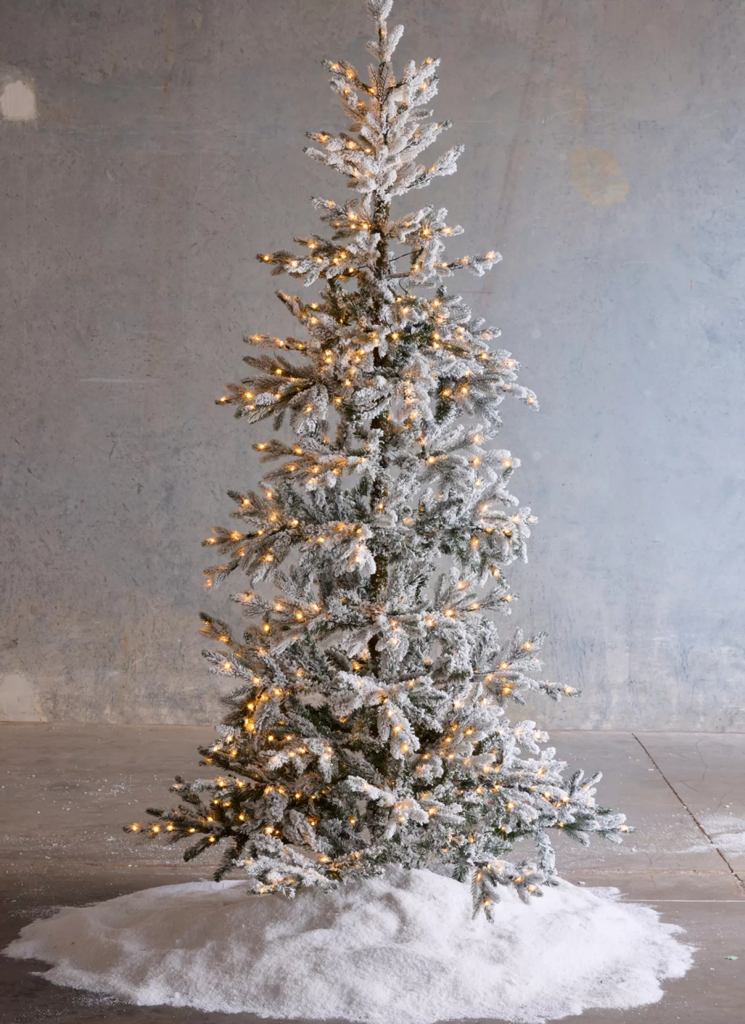 The Jolly Christmas Shop Celebrate The Season | Snow Christmas Decorations | Raz 7.5' Snake Light Flocked Silverado Fir Christmas Tree T4152003
