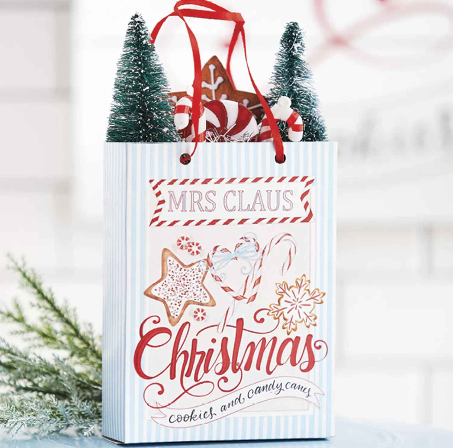 The Jolly Christmas Shop Jingle And Cocoa | Candy And Food | Raz 7.75" Mrs Claus Christmas Shopping Bag Ornament 4119022