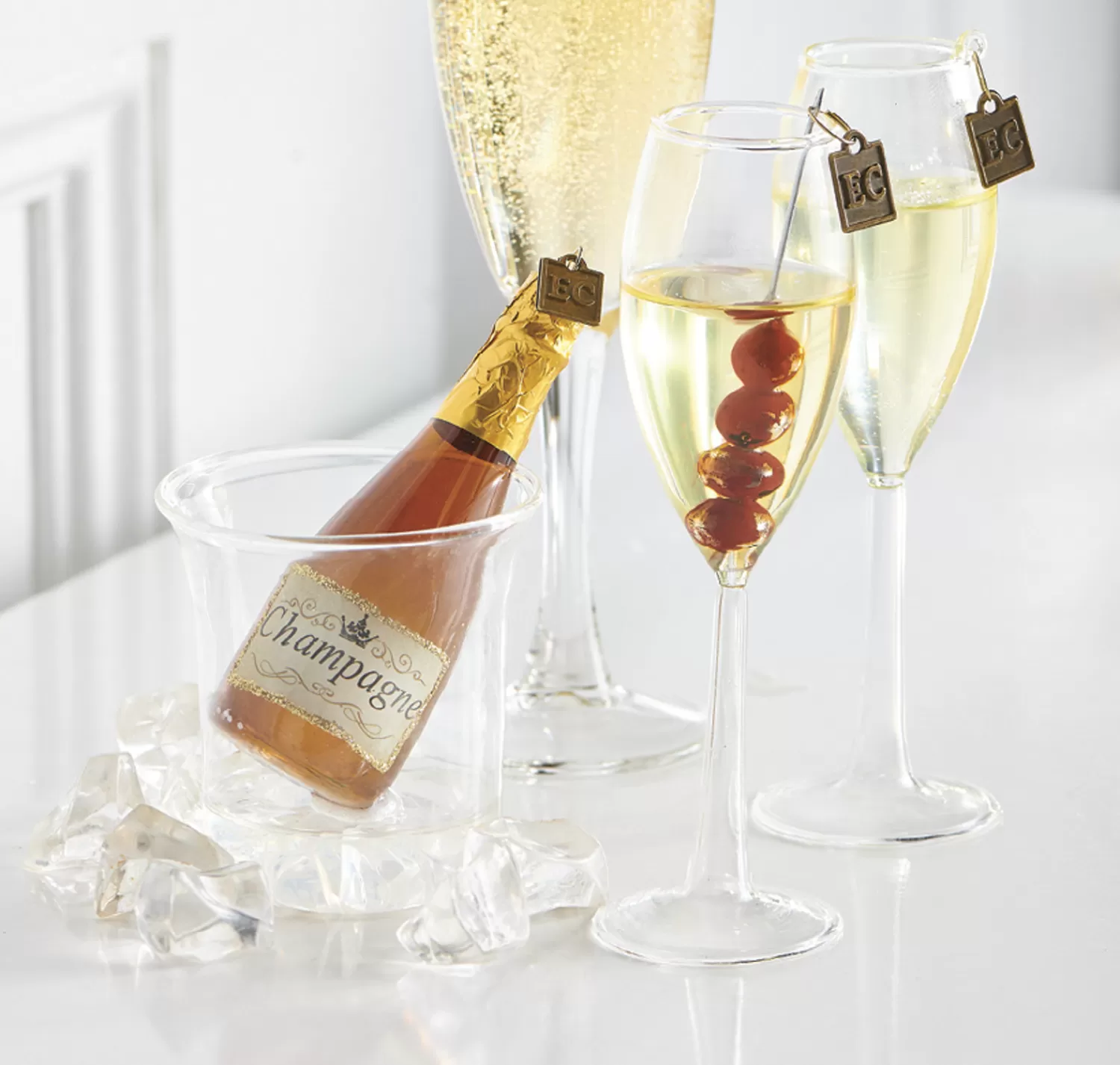 The Jolly Christmas Shop Holiday Cheers | Eric Cortina | Raz Eric Cortina 4.25" Ice Bucket With Champagne Glass Christmas Ornament 4053111